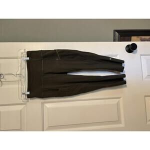 lululemon Green High-Rise Crop legging with 5 pockets and reflective dots